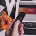 person holding Visa smart card